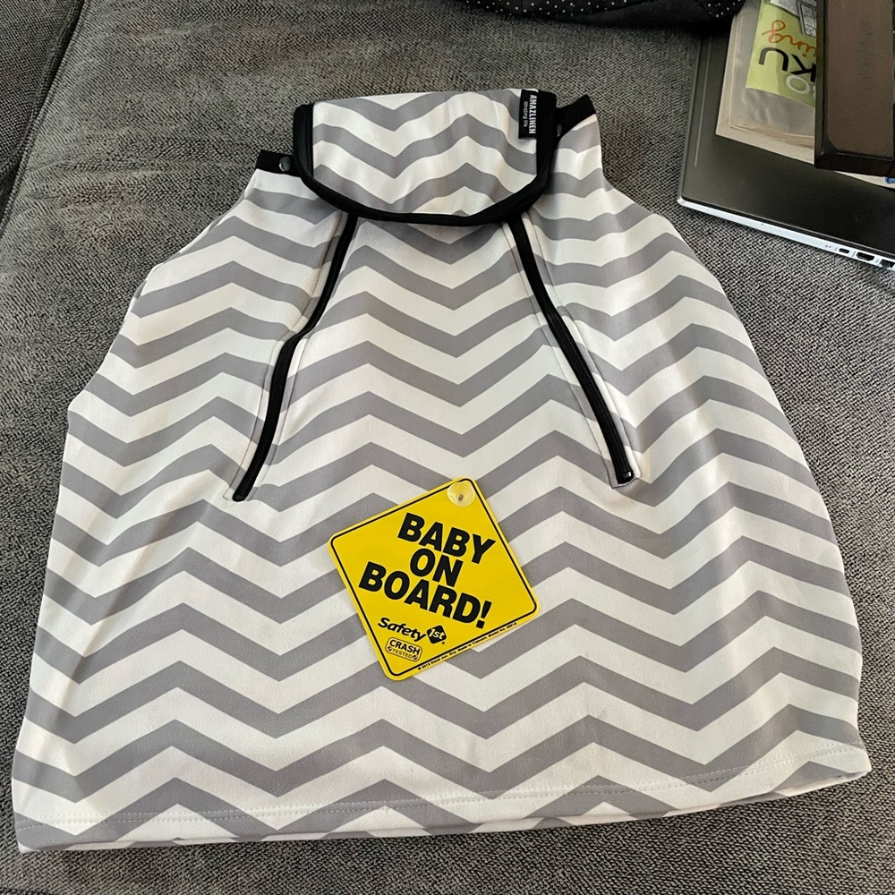Car seat cover and baby on board sign
